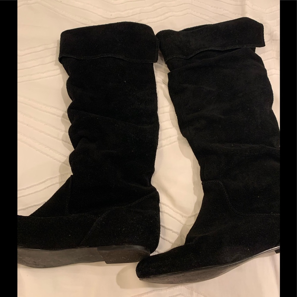 Suede leather slouch boots.